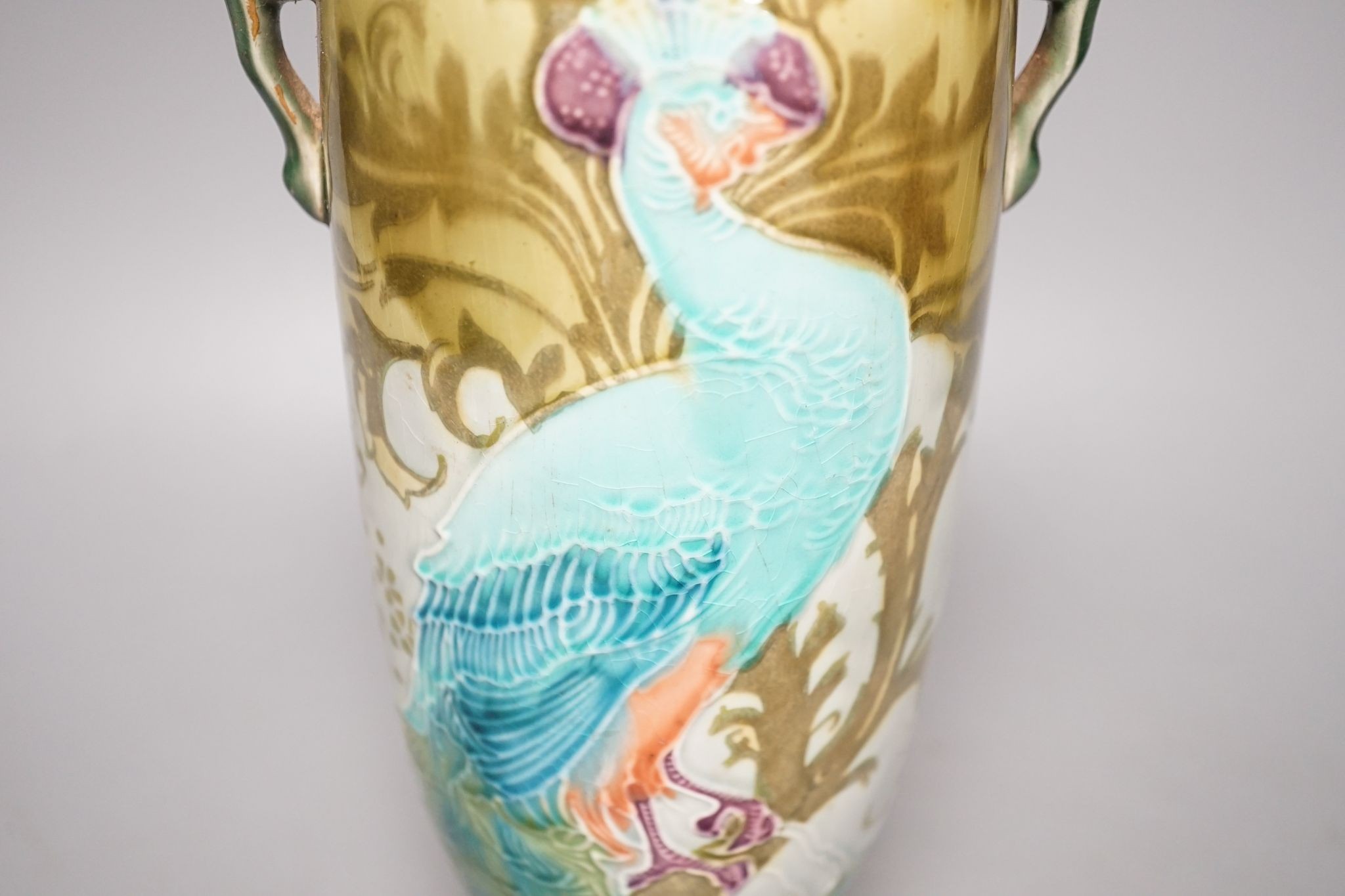 An Art Nouveau/Secessionist style Mintons ‘peacock’ vase (a.f.) 29cm